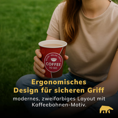 Person hält roten Roxlin Kaffee-to-go-Becher – ergonomisches Design für sicheren Griff