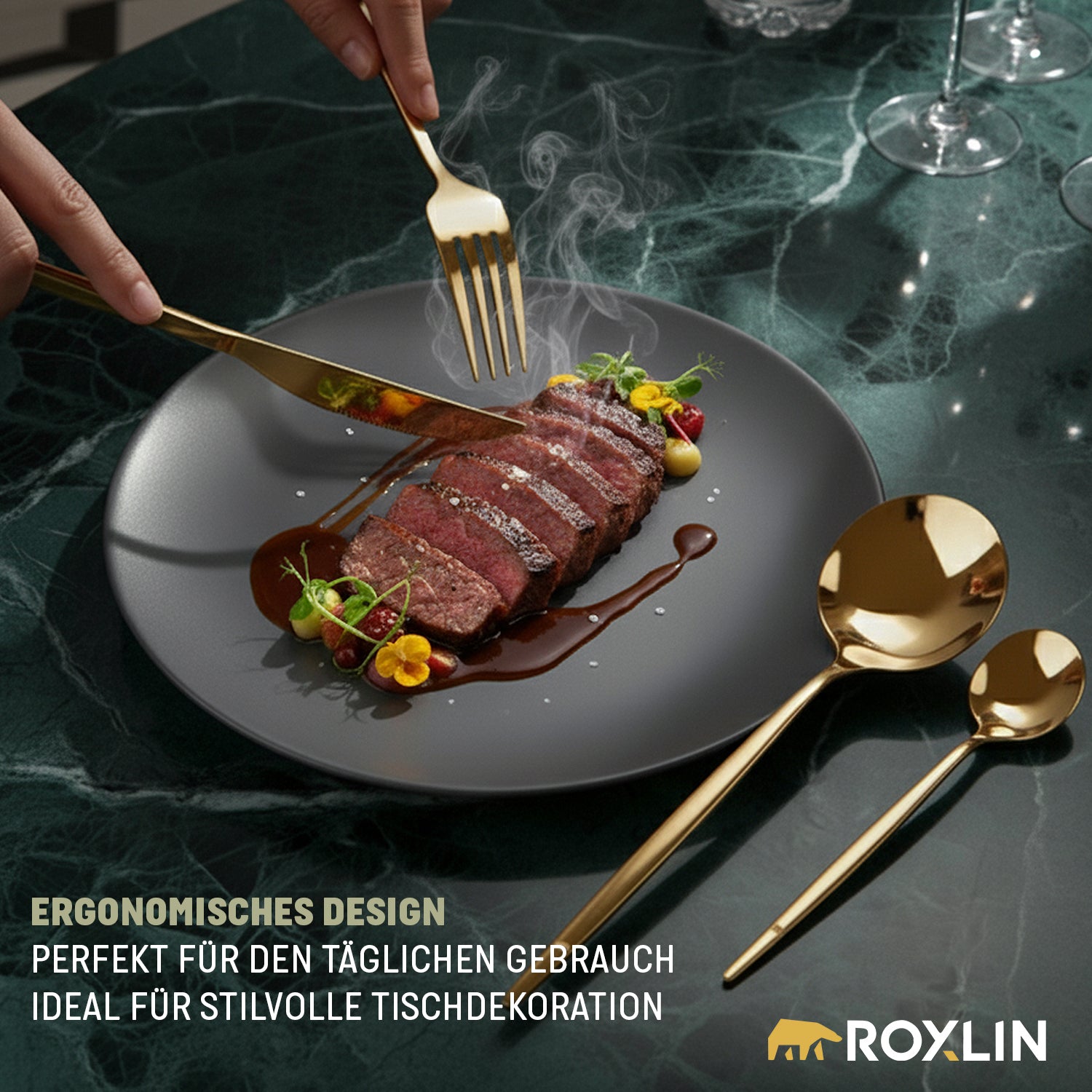 Roxlin Edelstahl-Besteckset in Gold auf dunklem Teller – ideal für festliche Tischdekoration